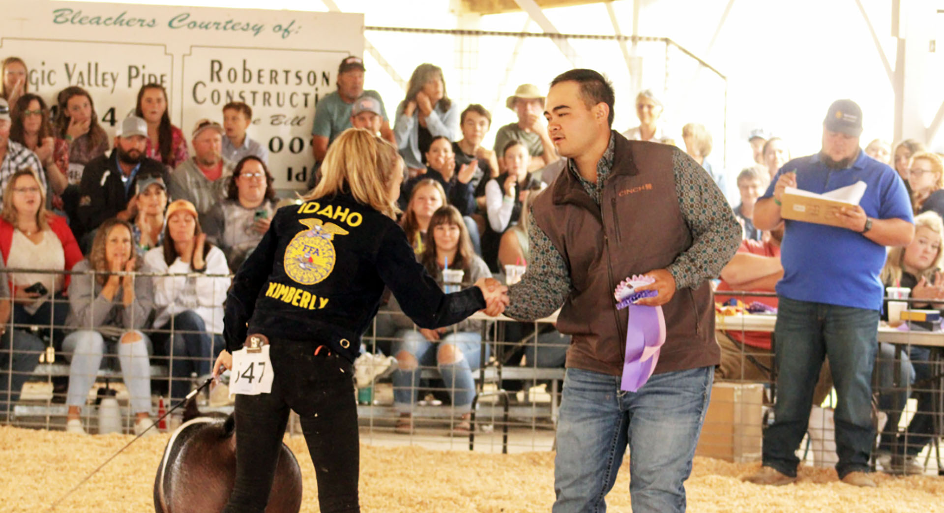 Freshman Ella Blickle receives an award during the 2023 Twin Falls County Fair FFA competition. | Photo by Ruby Blickle