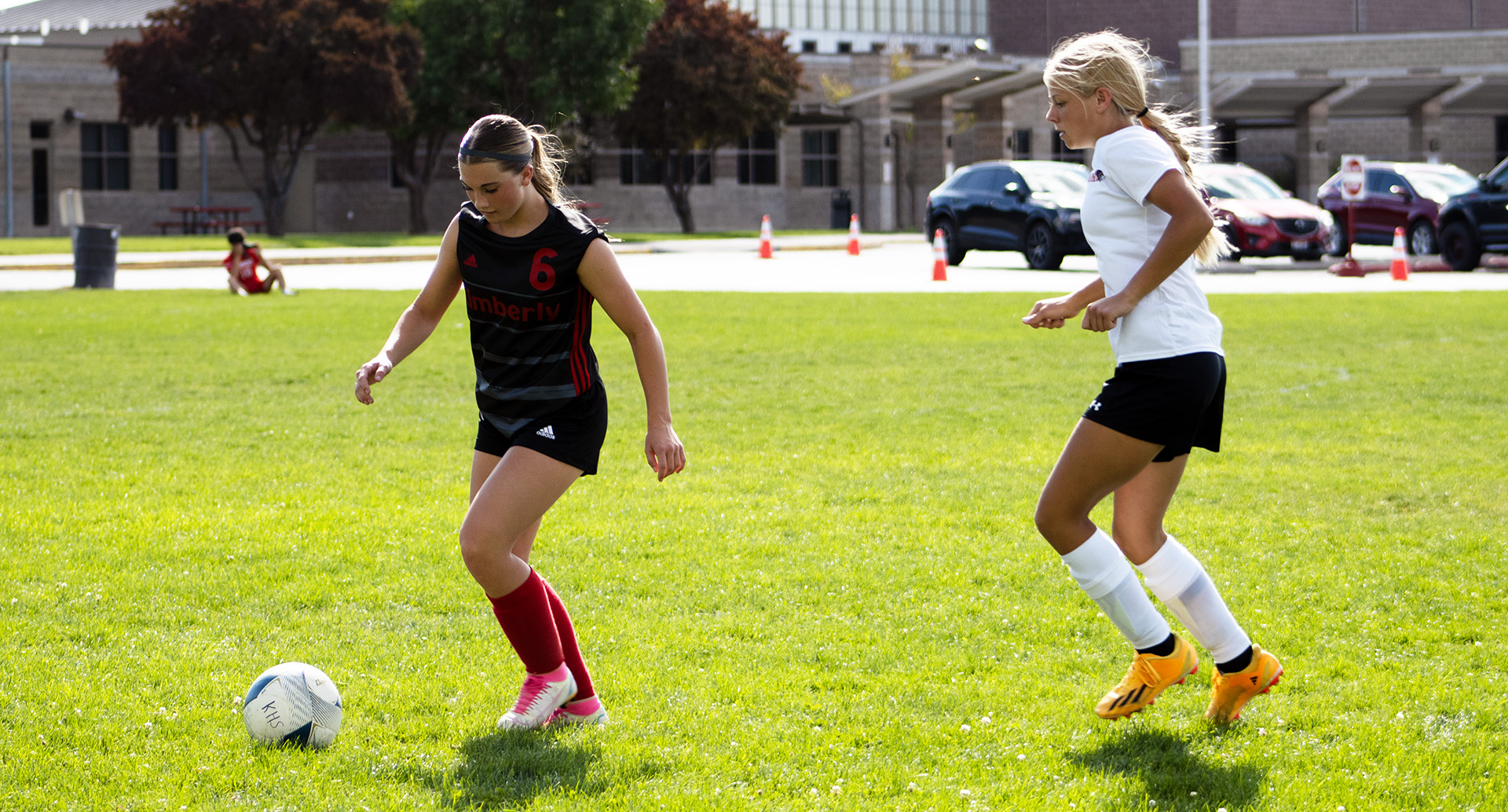 Senior Sydney Wayment controls the ball during a game against Bliss this season. | Photo by Talan Volkel