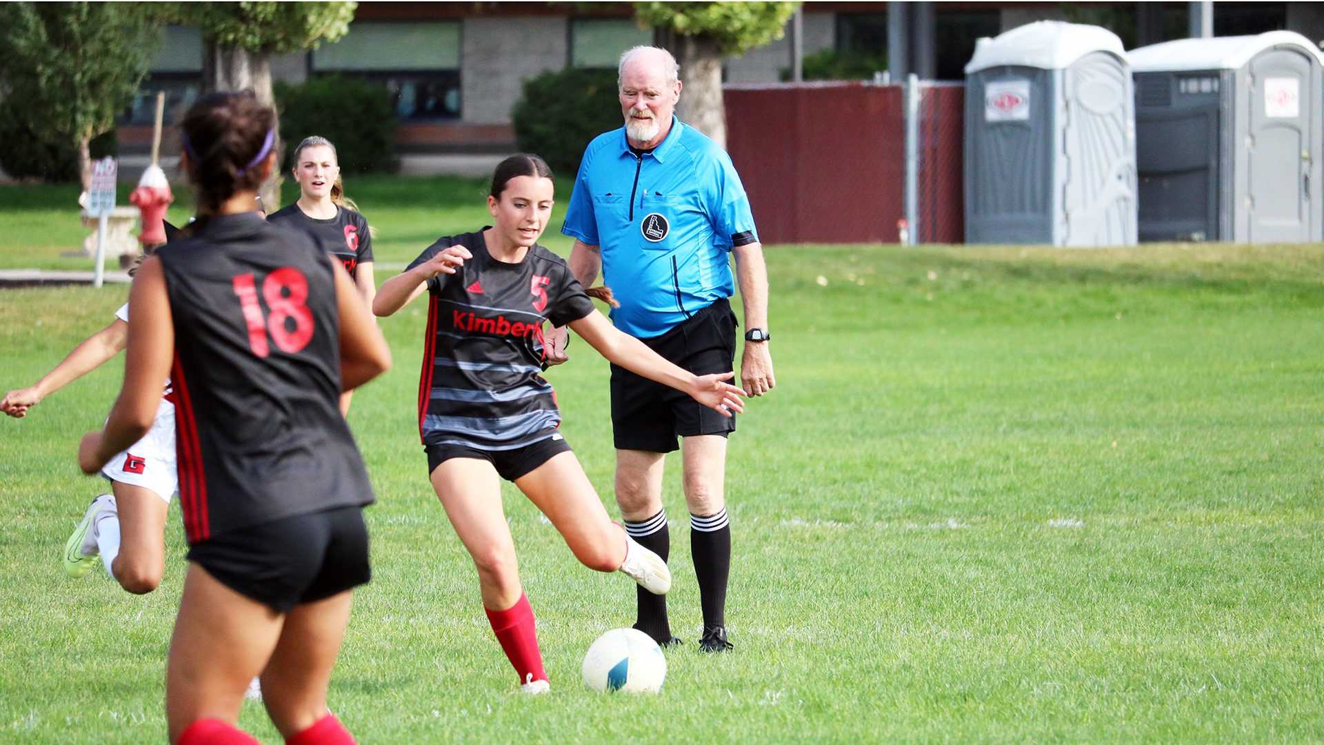 Senior Ava Wyatt kicks the ball during a game this season. | Photo by Publications staff