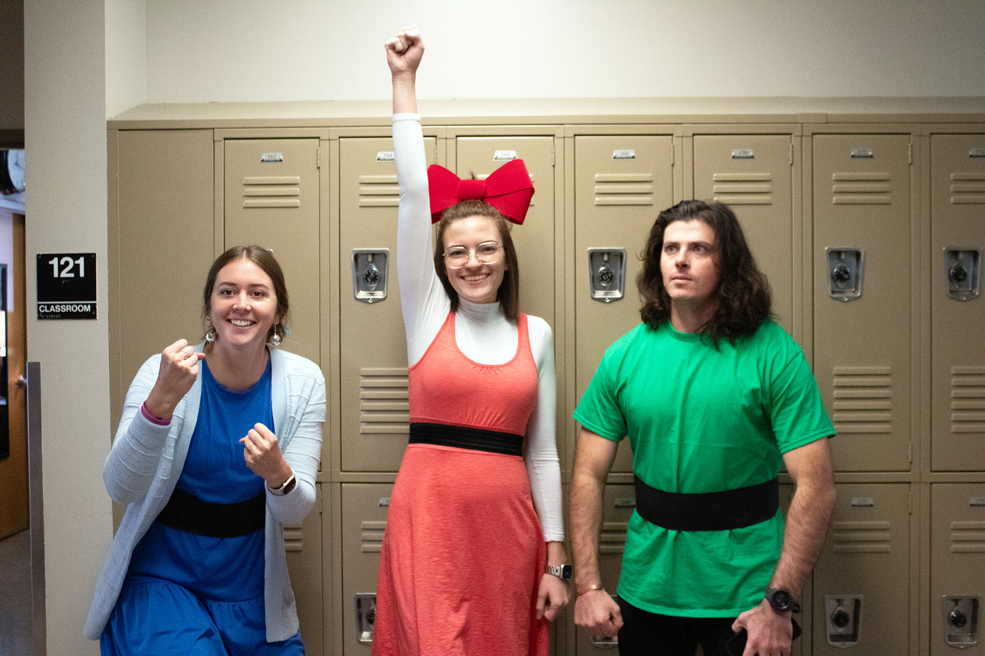 Mrs. Crockett (Bubbles), Miss Klahman (Blossom), and Mr. Bedke (Buttercup) pose as the Powerpuff Girls on Halloween. | Photo by Paizlee Goff