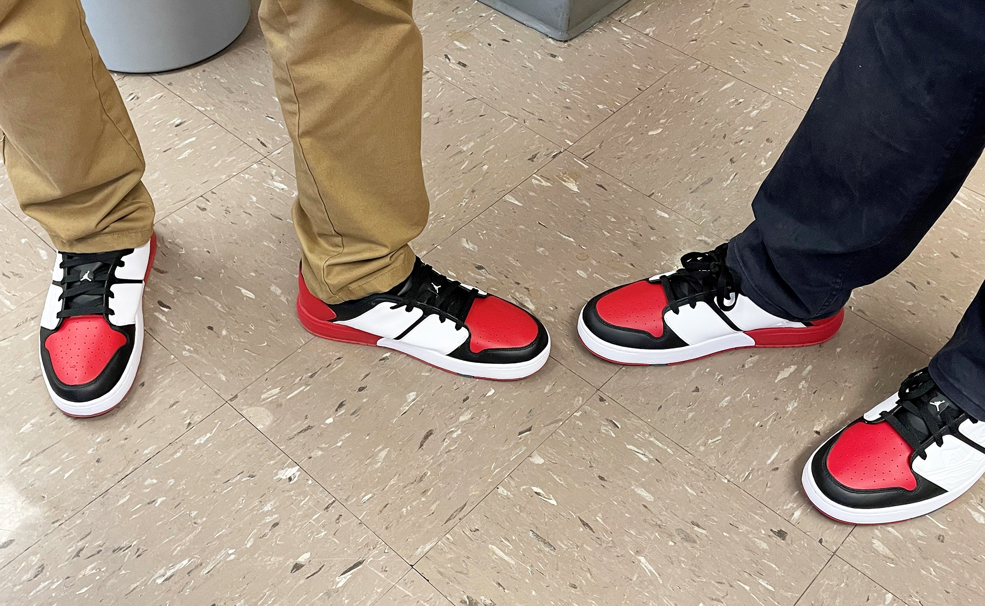 Mr. Glorfield and Mr. Dong show off matching pairs of shoes. | Submitted photo