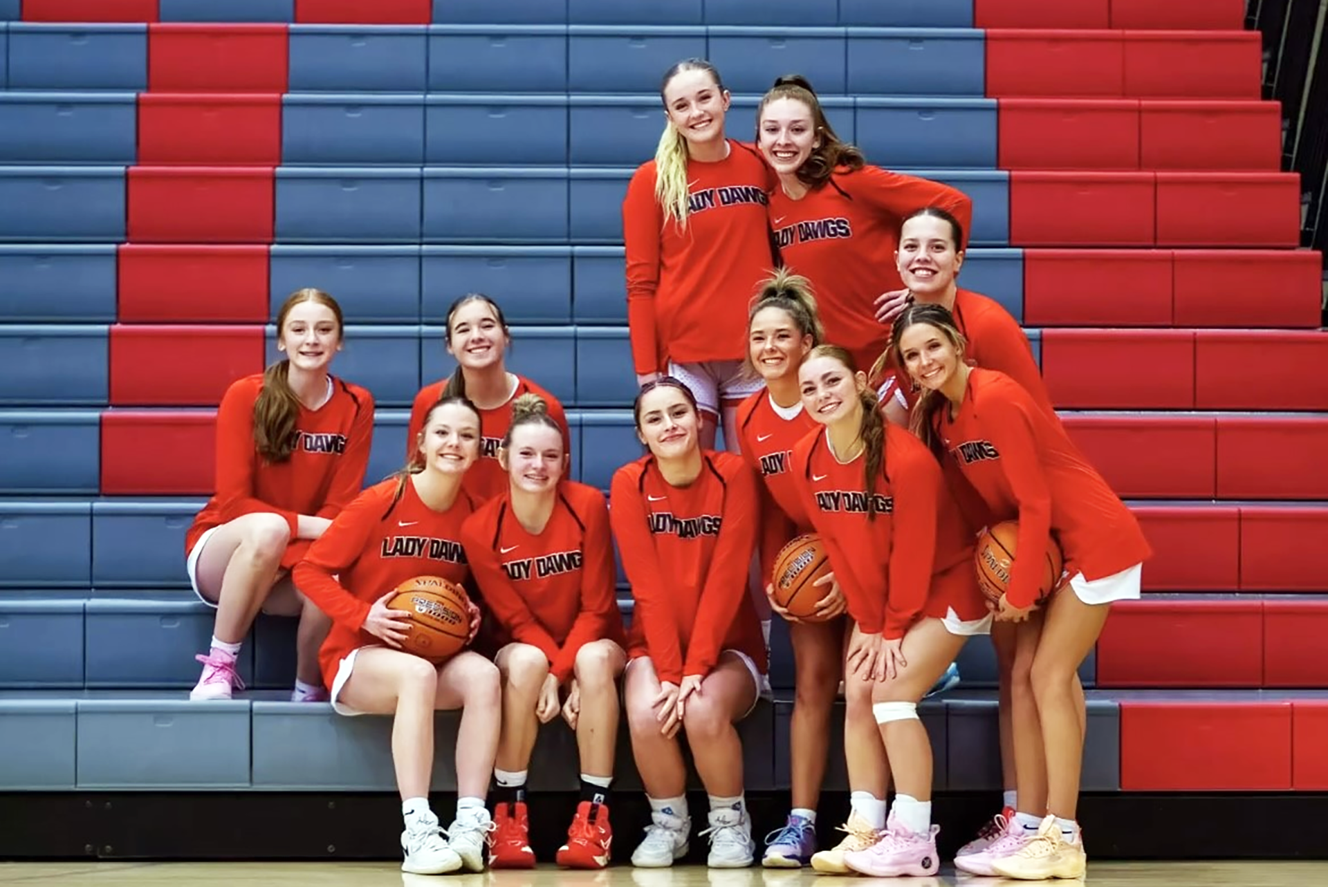 The girls basketball team poses for a picture before a game against Filer this season. | Submitted photo