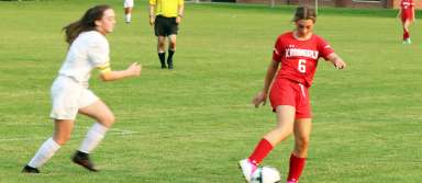 Sydney Wayment plays the ball during a game last season. | Photo by Publications staff