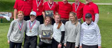 The KHS girls and boys golf teams pose with their district championship plaques. | Photo via Kimberly Booster Club