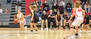 Emily Hanchey looks to pass the ball to Macy Dille during a game last season. | Photo by Emma Petersen